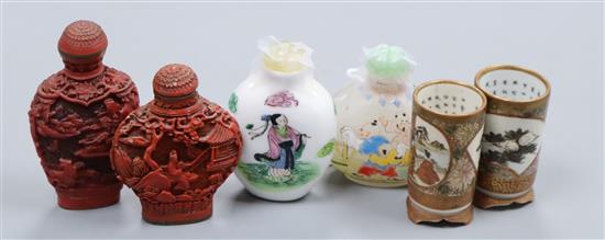 A pair of miniature Kutani brush pots and four Chinese snuff bottles,